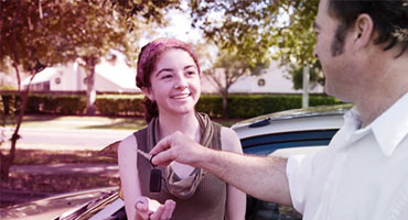 Teenager receiving keys