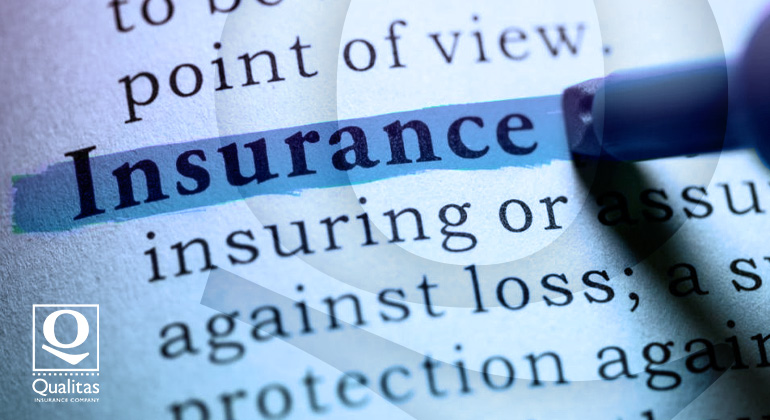 insurance definition highlighted on book