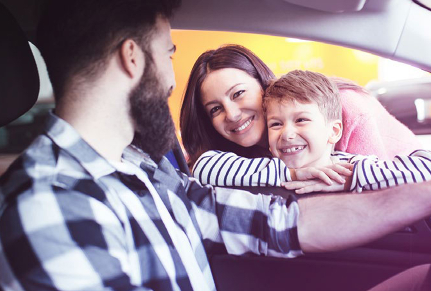 family in car